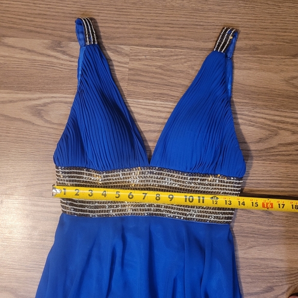 Elegant Blue Evening Gown with Gold Beading by Scala - Picture 13 of 16